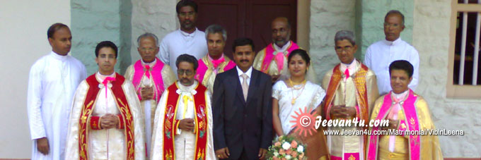 Vibin Leena wedding picture with Priests